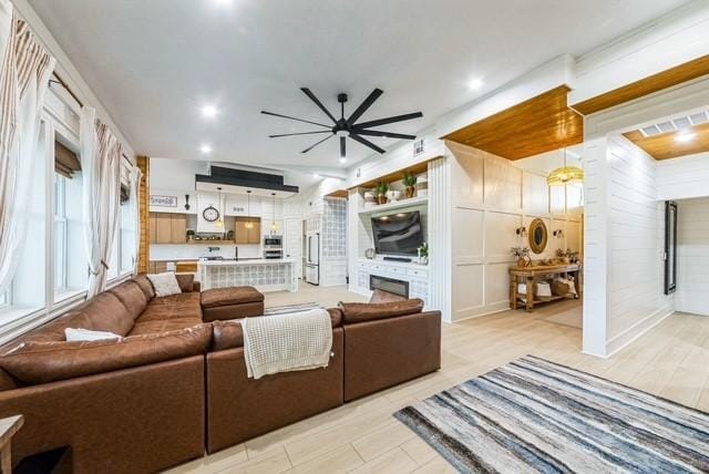209 Horse Shoe Trl, Angleton, TX 77515 - living area with a ceiling fan, a fireplace, and recessed lighting