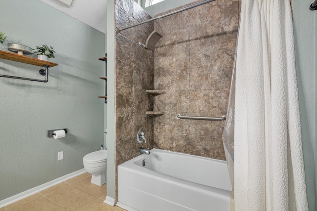 286 Ling St, Bayou Vista, TX 77563 - bathroom with tile patterned flooring, shower / bath combo with shower curtain, baseboards, and toilet