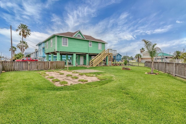 286 Ling St, Bayou Vista, TX 77563 - back of property featuring stairway and a shingled roof