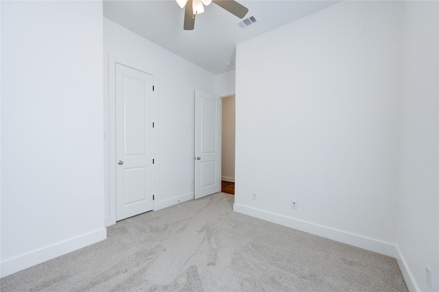 8964 Zurcher Ln, Houston, TX 77080 - unfurnished bedroom with carpet, baseboards, and ceiling fan