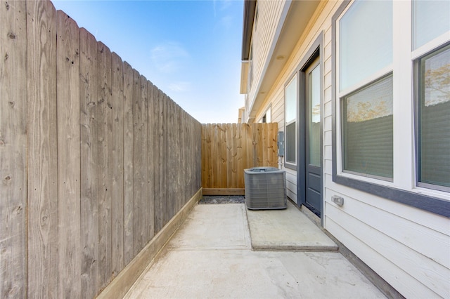 8964 Zurcher Ln, Houston, TX 77080 - view of patio featuring central air condition unit
