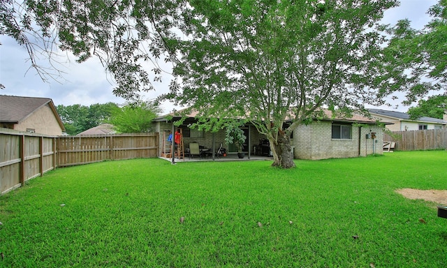 12662 Hackberry Dr, Willis, TX 77318 - view of yard featuring a patio area