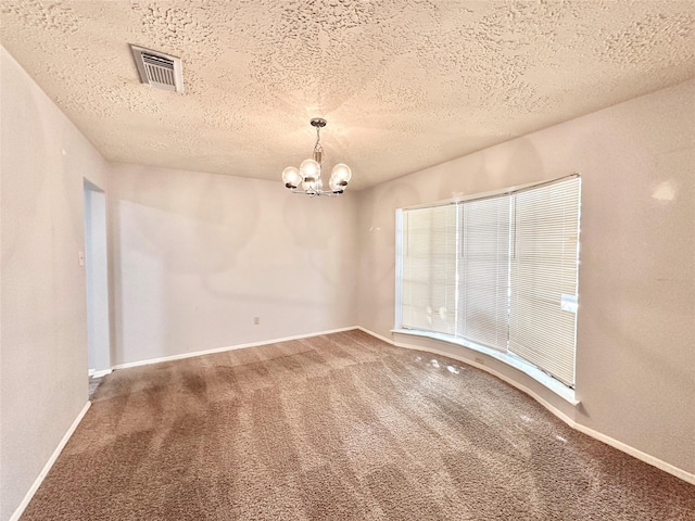 4515 Mossygate Dr, Spring, TX 77373 - unfurnished room featuring a chandelier, carpet flooring, a textured ceiling, and baseboards