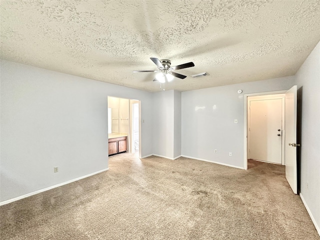 4515 Mossygate Dr, Spring, TX 77373 - carpeted spare room featuring a ceiling fan, baseboards, and a textured ceiling