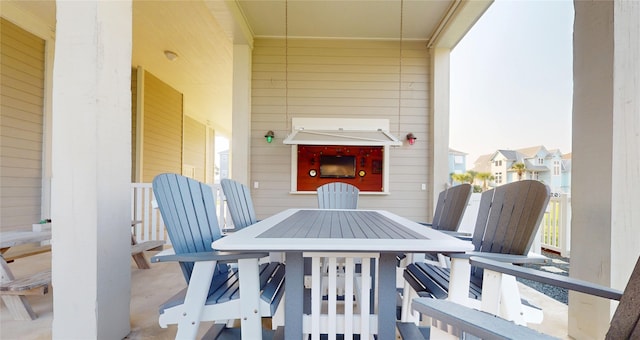 13830 Windlass Cir, Galveston, TX 77554 - view of patio / terrace featuring outdoor dining area