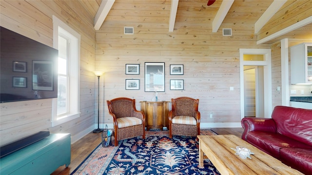 13830 Windlass Cir, Galveston, TX 77554 - sitting room featuring wood walls, wood finished floors, baseboards, and wood ceiling