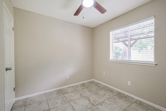 2738 Kettle Run, Sugar Land, TX 77479 - unfurnished room with baseboards, a ceiling fan, and light tile patterned floors