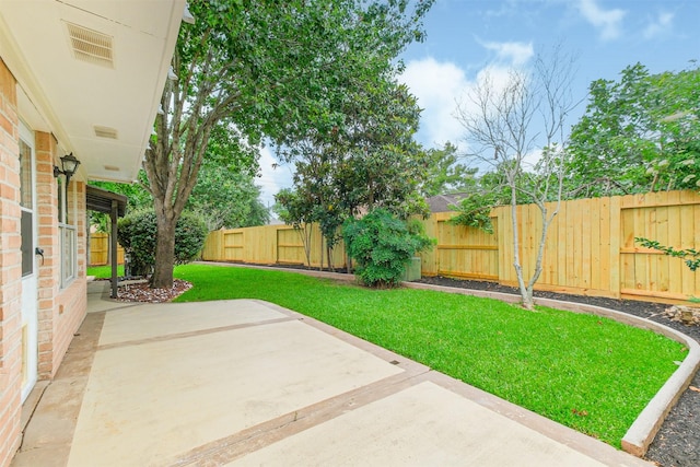 2738 Kettle Run, Sugar Land, TX 77479 - view of yard featuring a patio area