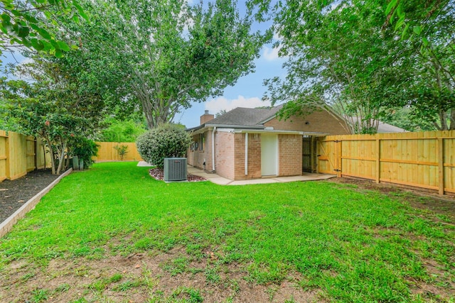 2738 Kettle Run, Sugar Land, TX 77479 - view of yard featuring central air condition unit and a patio