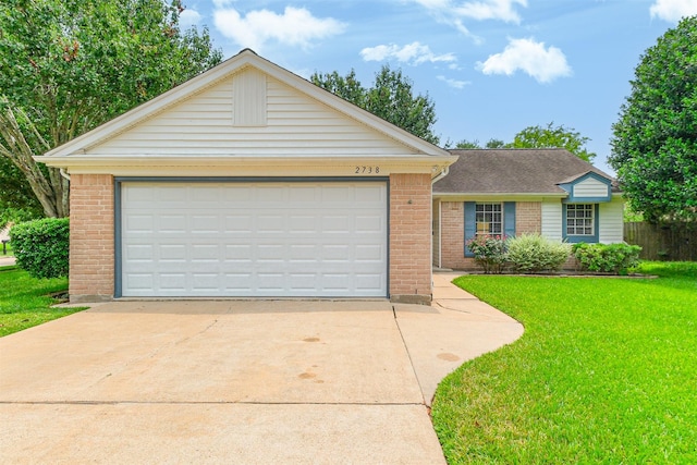 2738 Kettle Run, Sugar Land, TX 77479 - ranch-style house with brick siding, a garage, and a front yard