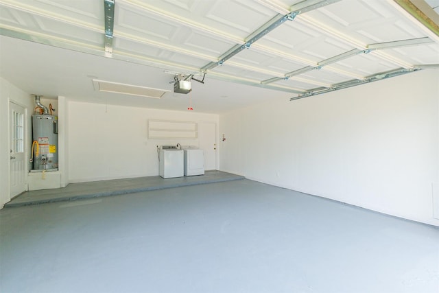 2738 Kettle Run, Sugar Land, TX 77479 - garage with washing machine and dryer, water heater, and a garage door opener