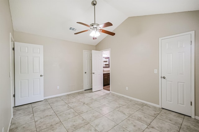 2738 Kettle Run, Sugar Land, TX 77479 - unfurnished bedroom featuring vaulted ceiling, light tile patterned flooring, ensuite bath, baseboards, and ceiling fan