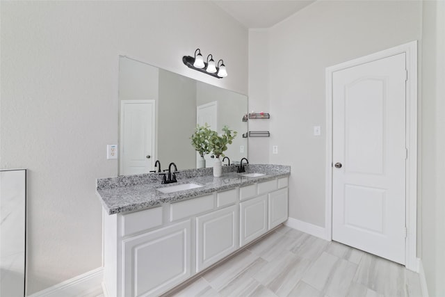 1706 Maddie Springs Ct, Spring, TX 77386 - full bathroom with double vanity and baseboards
