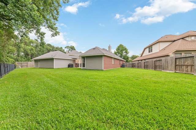 1706 Maddie Springs Ct, Spring, TX 77386 - back of house featuring a chimney and brick siding