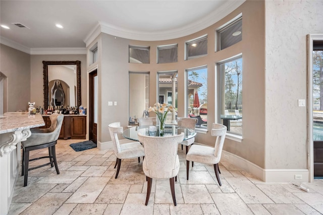 4510 Siandra Creek Ct, Spring, TX 77386 - dining space featuring stone tile floors, crown molding, recessed lighting, and baseboards