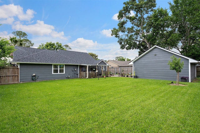 918 Hollow Tree St, La Porte, TX 77571 - rear view of property featuring a shingled roof