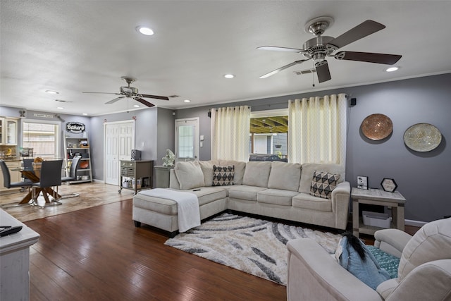 918 Hollow Tree St, La Porte, TX 77571 - living area with a ceiling fan, recessed lighting, wood finished floors, baseboards, and ornamental molding