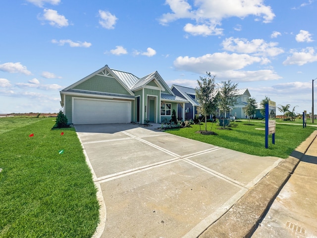 5218 Allen Cay, Texas City, TX 77590 - view of front facade featuring driveway, an attached garage, and a front yard