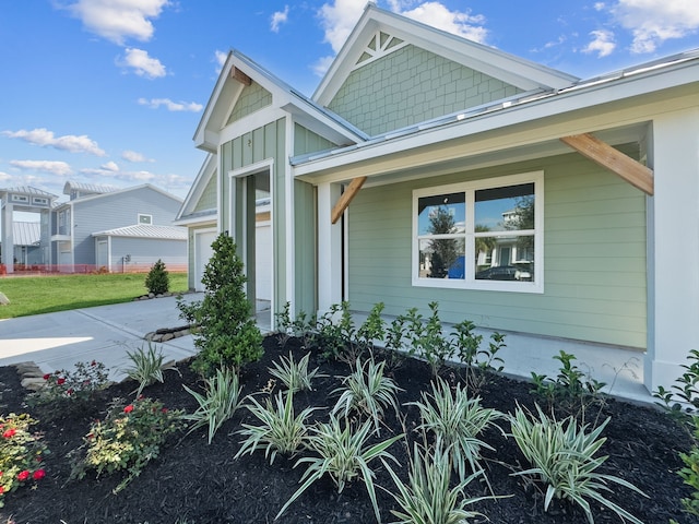 5218 Allen Cay, Texas City, TX 77590 - view of front facade with driveway, a garage, and covered porch
