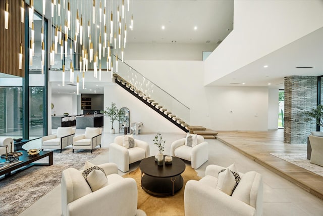 11206 Tyne Ct, Houston, TX 77024 - living area featuring a high ceiling and stairs
