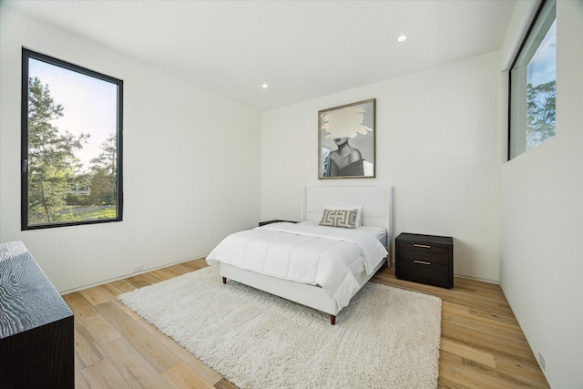 11206 Tyne Ct, Houston, TX 77024 - bedroom featuring light wood-style floors and recessed lighting