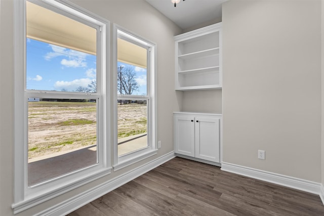 595 Fm 2968, Grapeland, TX 75844 - empty room with dark wood-style flooring and baseboards