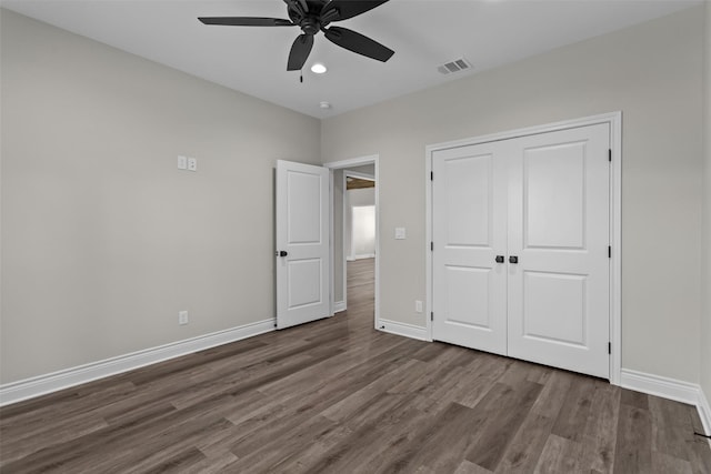 595 Fm 2968, Grapeland, TX 75844 - unfurnished bedroom with wood finished floors, baseboards, a closet, a ceiling fan, and recessed lighting