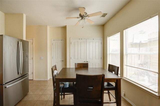 23610 Youpon Lake Ln, Spring, TX 77373 - dining room featuring a ceiling fan, light tile patterned flooring, and baseboards