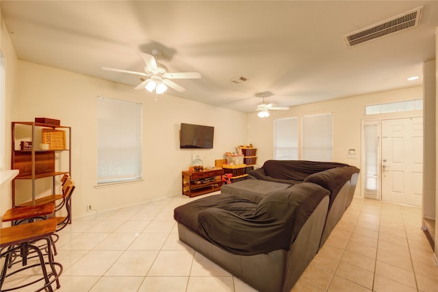 23610 Youpon Lake Ln, Spring, TX 77373 - living area with light tile patterned floors and ceiling fan