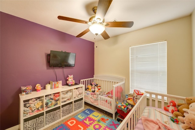 23610 Youpon Lake Ln, Spring, TX 77373 - bedroom with ceiling fan and a nursery area