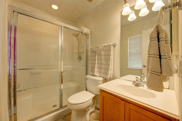 23610 Youpon Lake Ln, Spring, TX 77373 - bathroom with a shower stall, toilet, vanity, and a chandelier