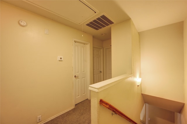 23610 Youpon Lake Ln, Spring, TX 77373 - corridor featuring attic access, carpet, and baseboards