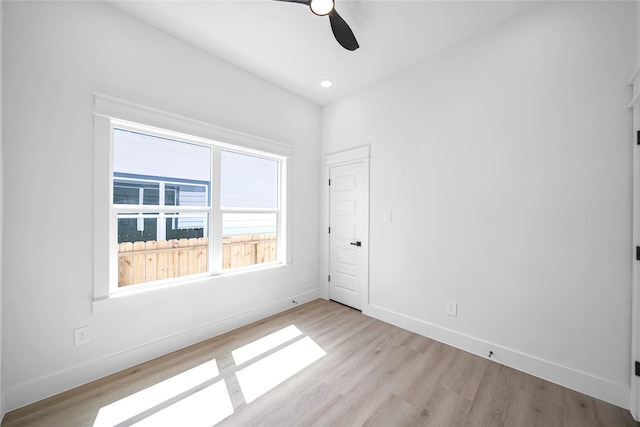 4902 Higgins St B, Unit A, Houston, TX 77033 - unfurnished room featuring ceiling fan, light wood-style floors, and baseboards