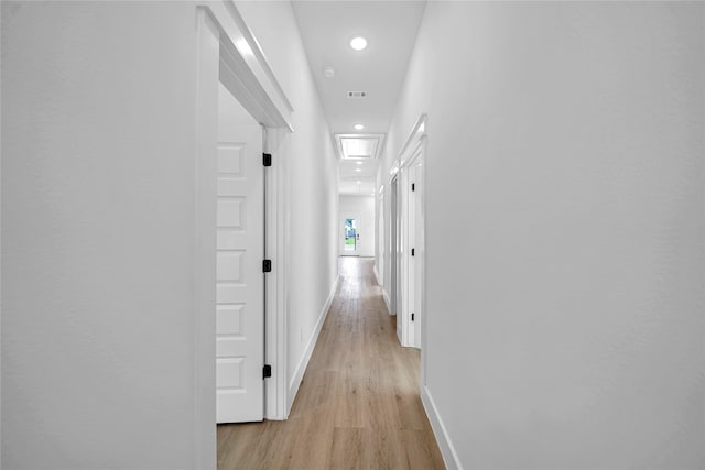 4902 Higgins St B, Unit A, Houston, TX 77033 - corridor with light wood finished floors, baseboards, and recessed lighting