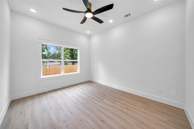 4902 Higgins St B, Unit A, Houston, TX 77033 - empty room with light wood-style flooring, ceiling fan, baseboards, and recessed lighting