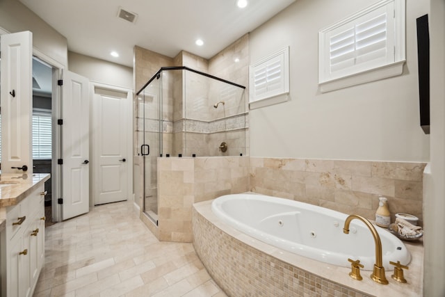 3202 Mid Ln, Houston, TX 77027 - full bathroom with a jetted tub, a stall shower, vanity, recessed lighting, and tile patterned flooring