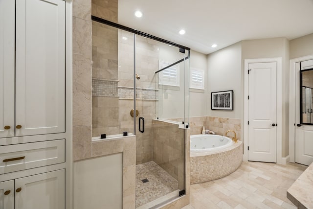 3202 Mid Ln, Houston, TX 77027 - bathroom featuring a jetted tub, a shower stall, recessed lighting, and tile patterned flooring