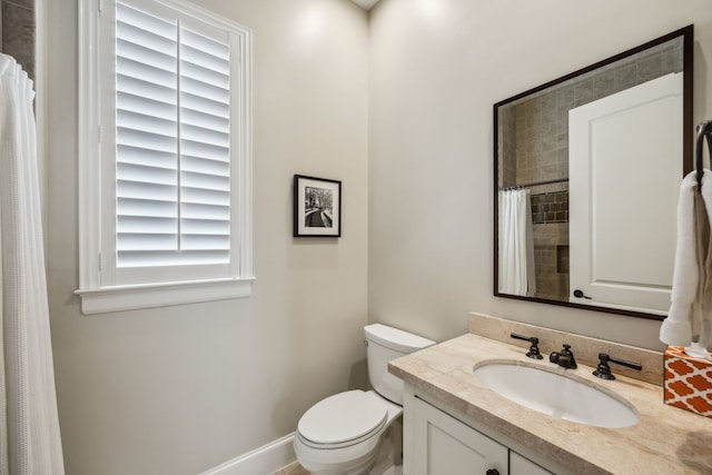 3202 Mid Ln, Houston, TX 77027 - bathroom with vanity, toilet, and a shower with shower curtain