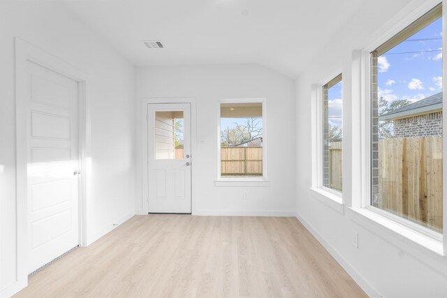 405 Amy St, Angleton, TX 77515 - unfurnished sunroom with lofted ceiling