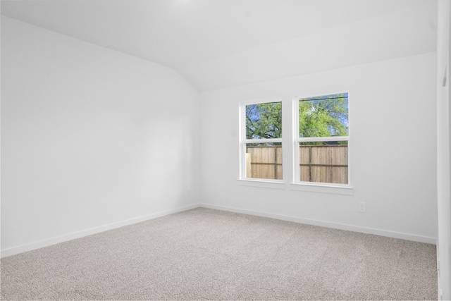405 Amy St, Angleton, TX 77515 - unfurnished room featuring carpet floors, vaulted ceiling, and baseboards
