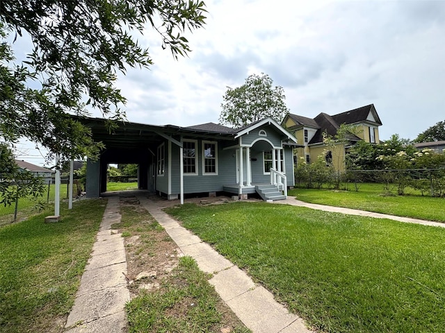 2385 Neches St, Beaumont, TX 77701 - view of front of property featuring concrete driveway and an attached carport