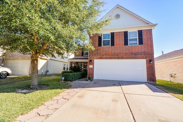 3434 Zephyr Glen Way, Houston, TX 77084 - view of front of home featuring brick siding, driveway, a garage, and a front yard