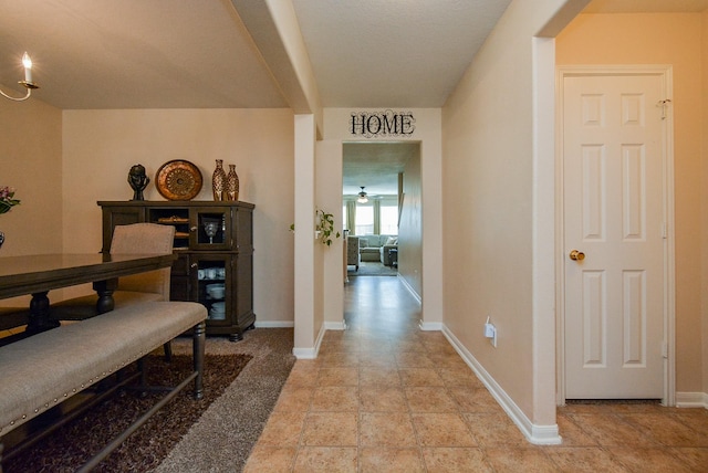 3434 Zephyr Glen Way, Houston, TX 77084 - hall featuring baseboards and light stone finish floors