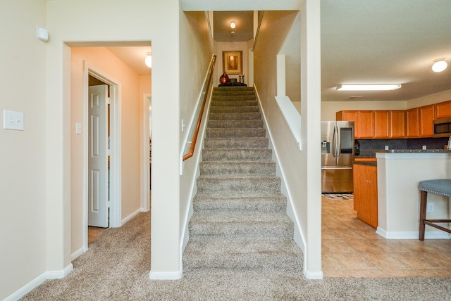 3434 Zephyr Glen Way, Houston, TX 77084 - stairway featuring carpet flooring and baseboards