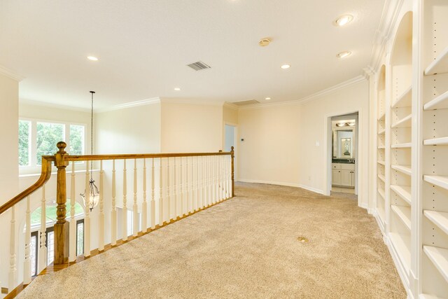1 Heritage Oak Ct, Lake Jackson, TX 77566 - hallway with crown molding, carpet, recessed lighting, an upstairs landing, and baseboards