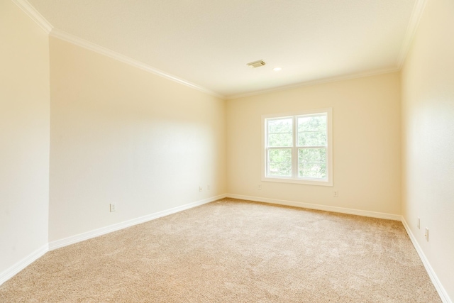 1 Heritage Oak Ct, Lake Jackson, TX 77566 - empty room featuring light colored carpet, ornamental molding, and baseboards