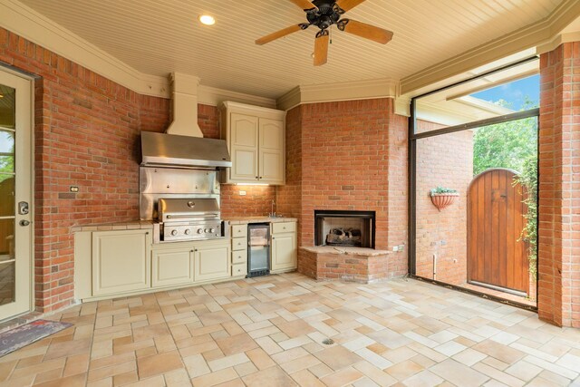 1 Heritage Oak Ct, Lake Jackson, TX 77566 - view of patio featuring ceiling fan, an outdoor brick fireplace, and a gate