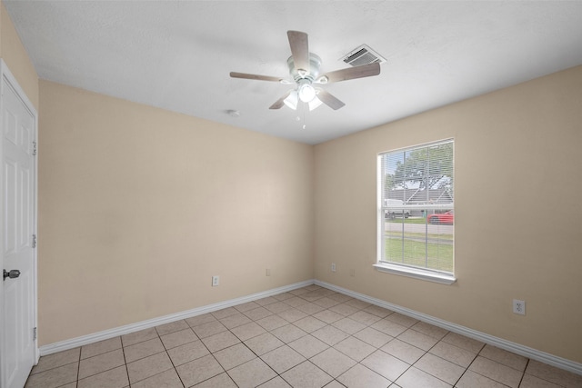 2401 Kingsdale Dr, Deer Park, TX 77536 - empty room featuring ceiling fan, baseboards, and light tile patterned flooring