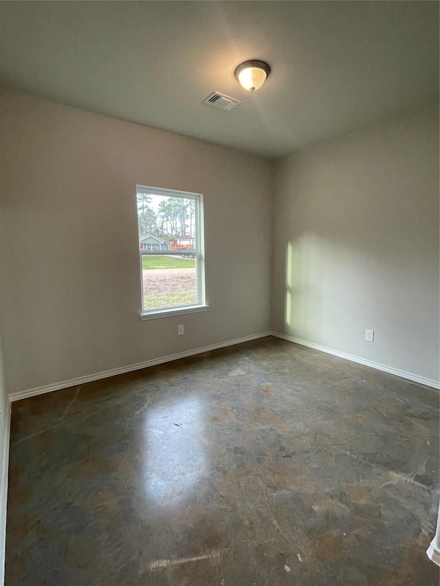 116 Indian Creek Cir, Willis, TX 77378 - spare room featuring concrete floors and baseboards
