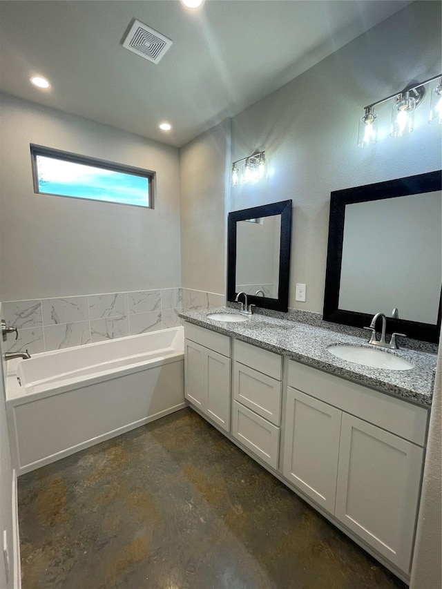 116 Indian Creek Cir, Willis, TX 77378 - full bathroom with concrete floors, double vanity, and a bath